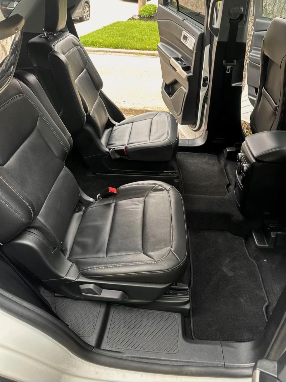 After: Ford Explorer second row deep cleaned with shampoo extraction — Plano, TX