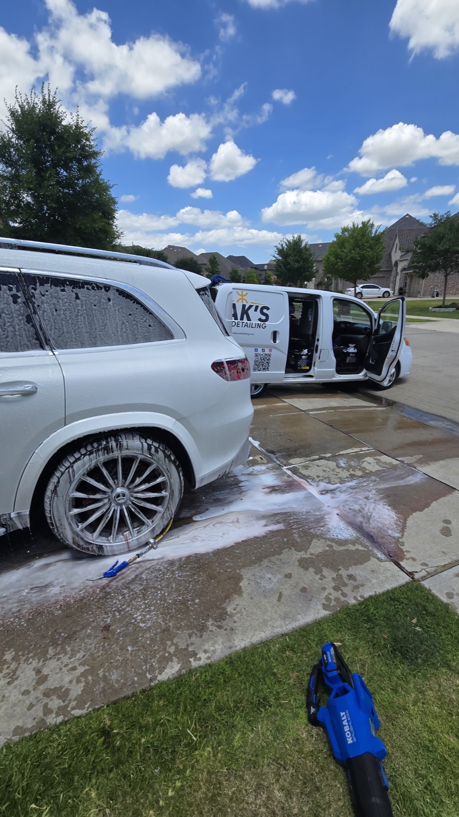 Mobile detailing setup and foam wash in a customer driveway — Frisco, TX